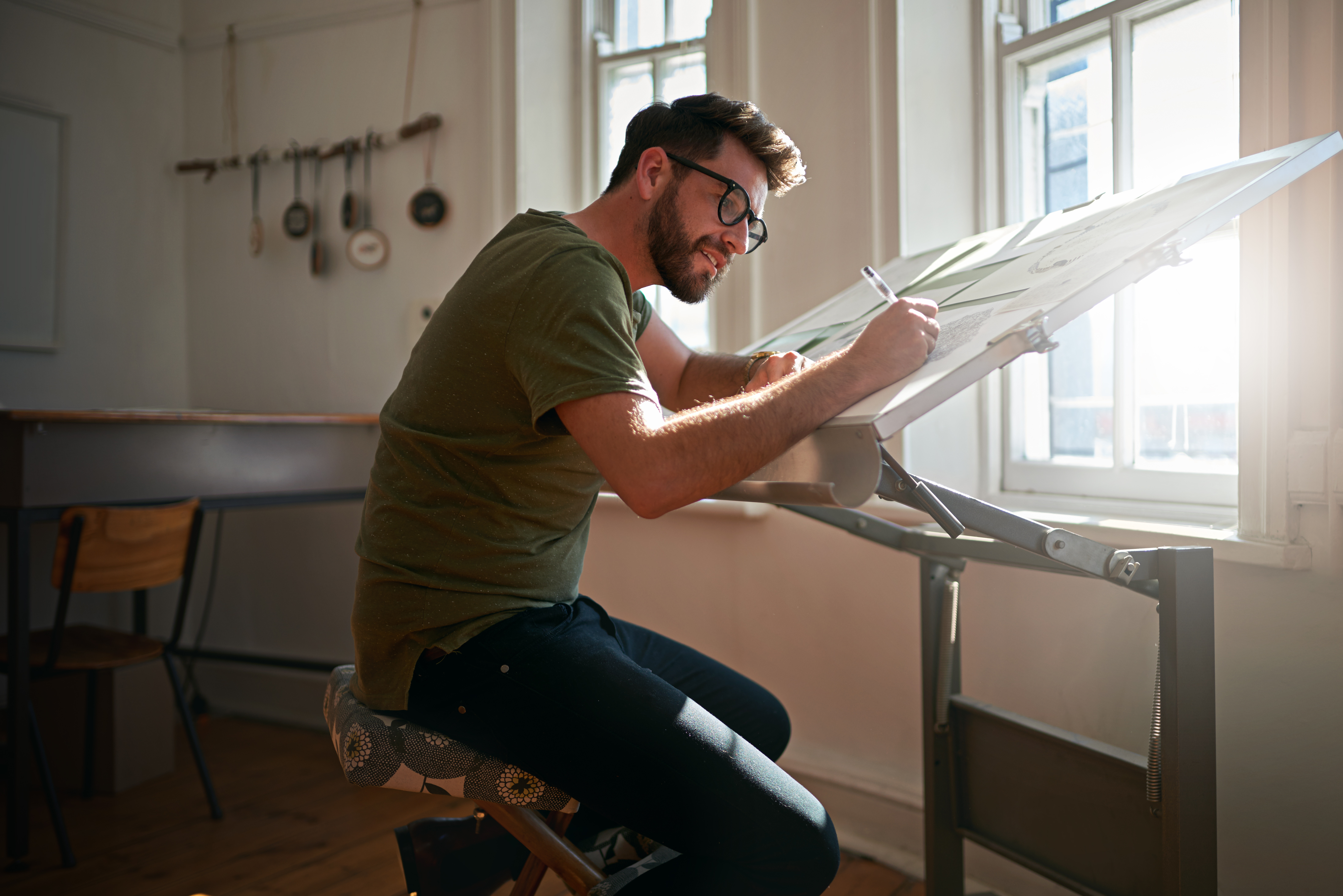 Man drawing in a studio